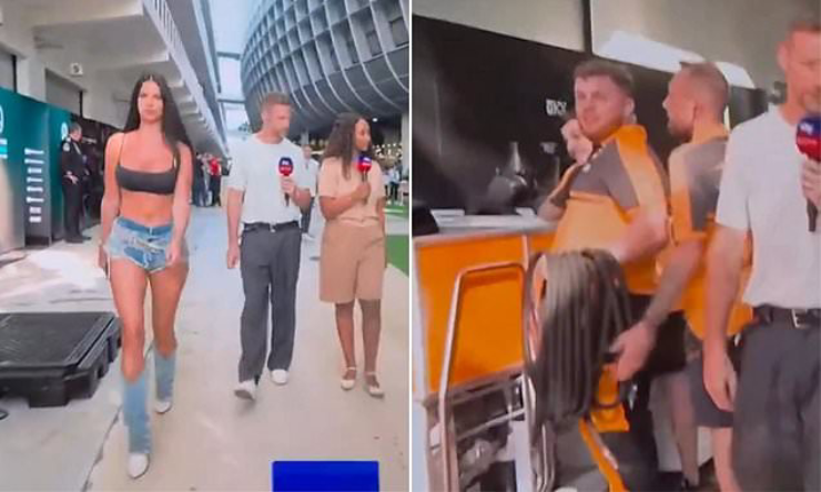 Camera thay vì quay vào Jenson Button thì lại chuyển cảnh sang cô nàng xinh đẹp đi qua