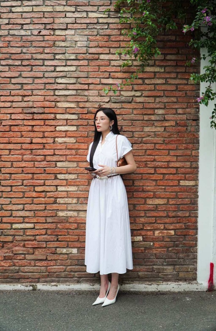 Ảnh sao 3/7: Mỹ Tâm 'gây thương nhớ' với áo dài trắng - 3