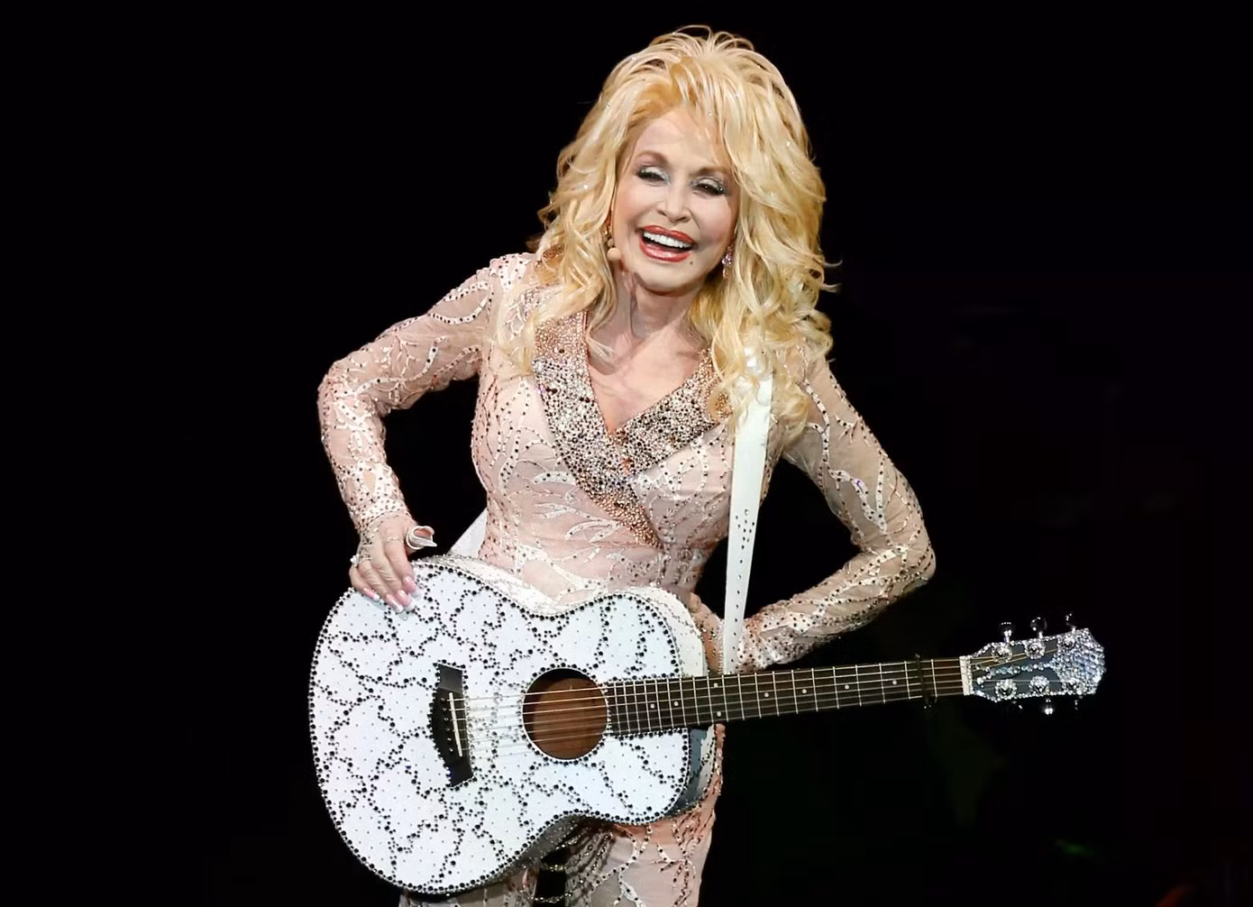 Bà Parton ba lần từ chối nhận Huân chương Tự do của tổng thống vì không muốn dính dáng đến chính trị. Ảnh: Jim Gensheimer.