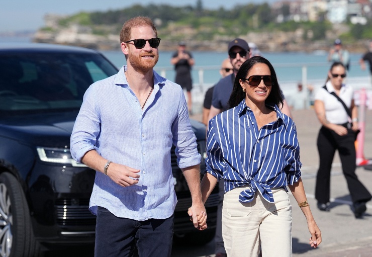Vợ chồng Harry và Meghan ở Sydney, Australia hồi tháng 4. Ảnh: AFP