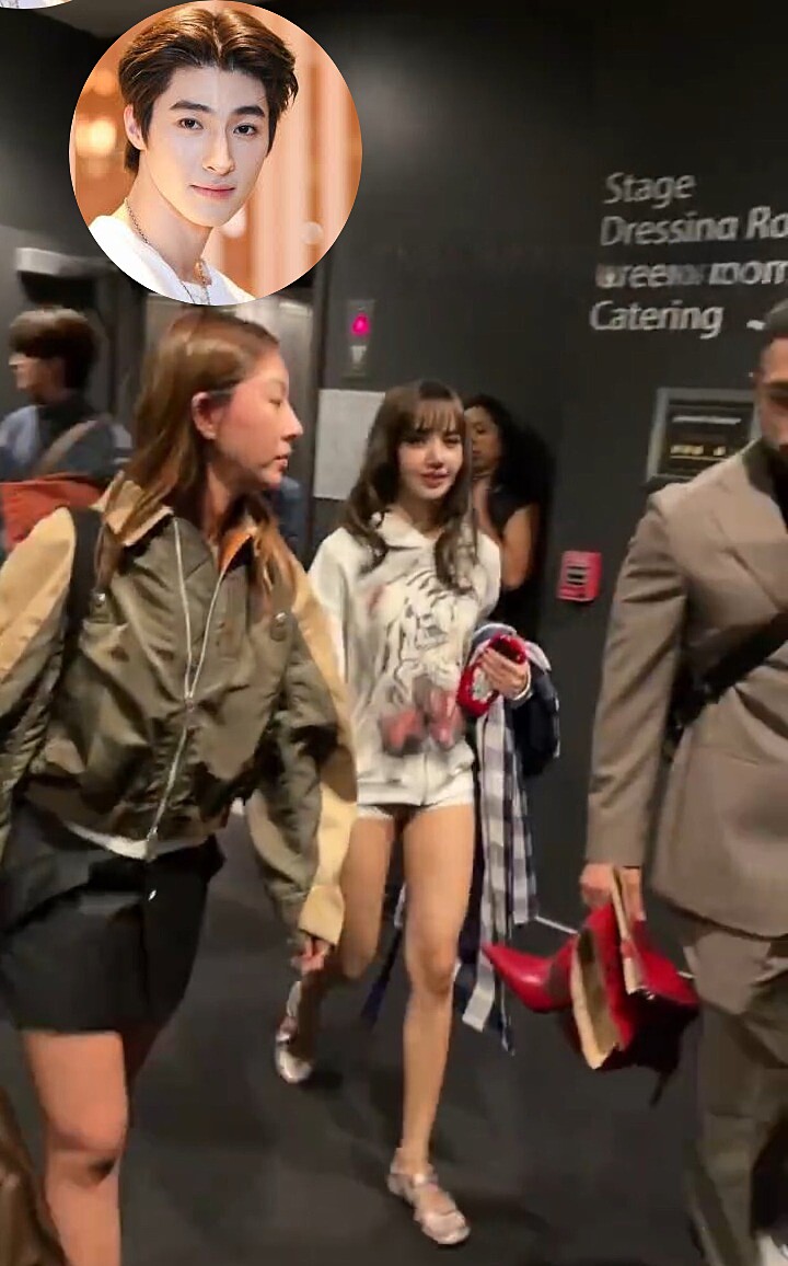 Lisa có Blue hộ tống phía sau, tại VMAs. Ảnh: TikTok