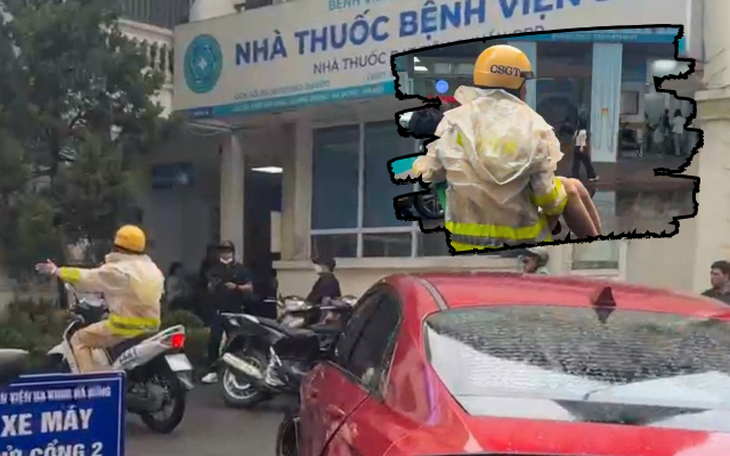 Trong lúc làm nhiệm vụ tại ngã tư Quang Trung - Văn Khê, hai cán bộ CSGT nhận được đề nghị mở đường cho ô tô chở nam sinh có tiền sử bệnh tim, đang trong tình trạng mê man đến bệnh viện. (Ảnh Công an TP Hà Nội)